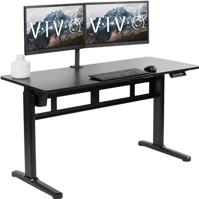 Electric desk with a 55-inch by 24-inch desktop.