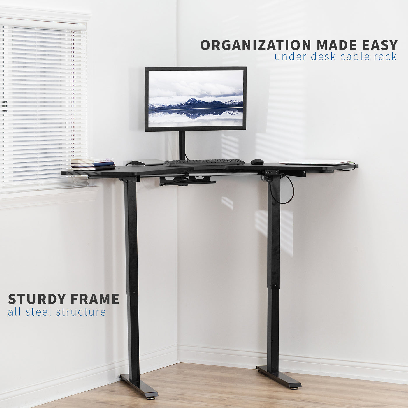 Electric height adjustable Corner desk with a sturdy frame.