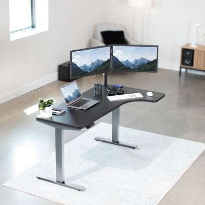 Sturdy sit or stand desktop workstation with adjustable height using smart control panel.