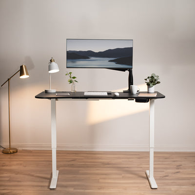 Ergonomic sit or stand active workstation with adjustable height using touch screen control panel.