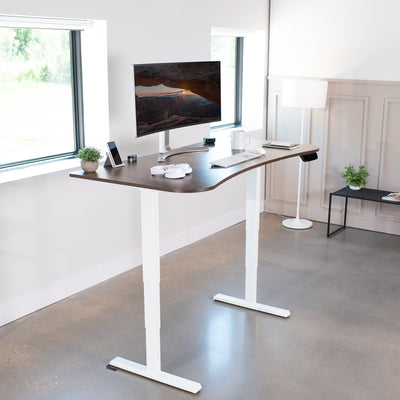 Sturdy rustic sit or stand desktop workstation with adjustable height and wide tabletop surface.