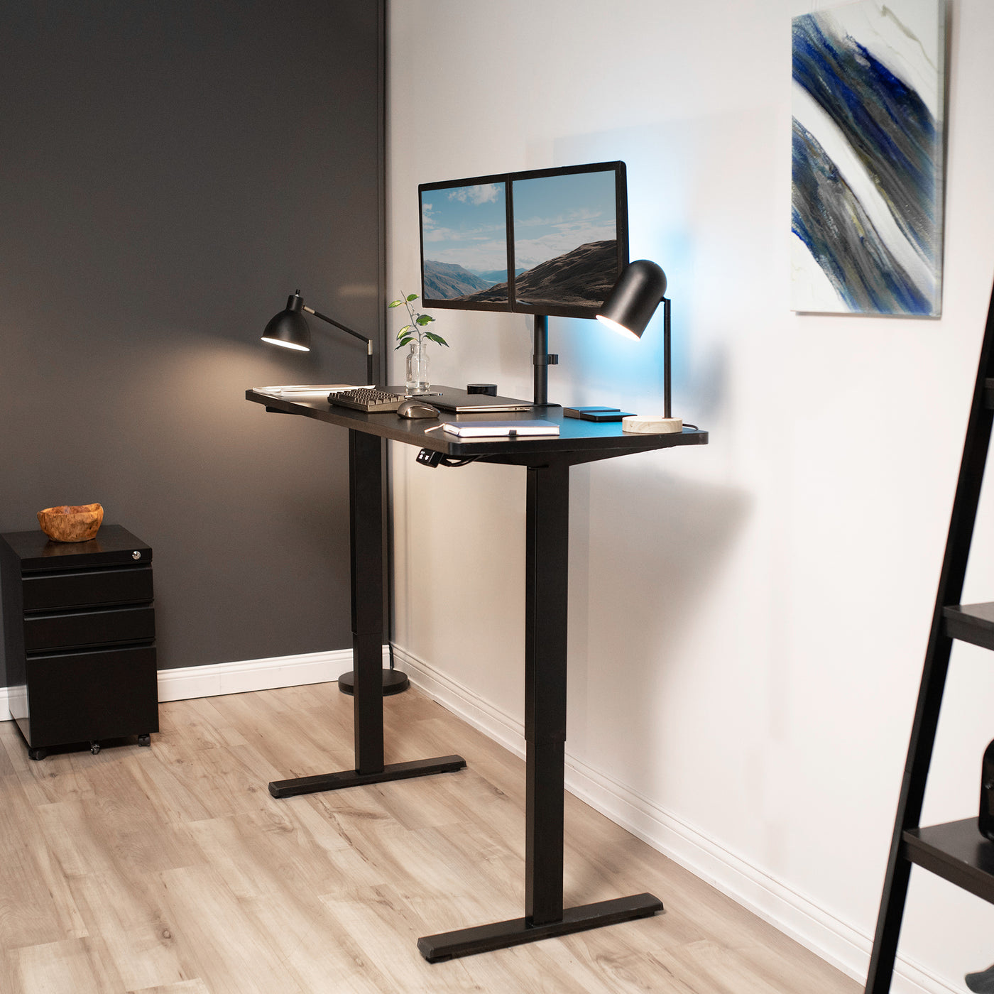Sturdy electric sit or stand desk workstation with adjustable height.Heavy-duty electric height adjustable desktop workstation for active sit or stand efficient workspace.