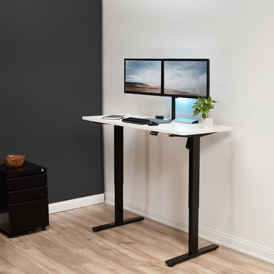Heavy-duty electric height adjustable desktop workstation for active sit or stand efficient workspace.