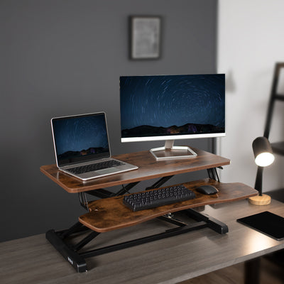 Rustic heavy-duty height adjustable desk converter platform with 2 tiers.