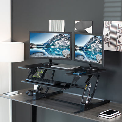 Modern workstation from VIVO with a sit-to-stand office desk setup.